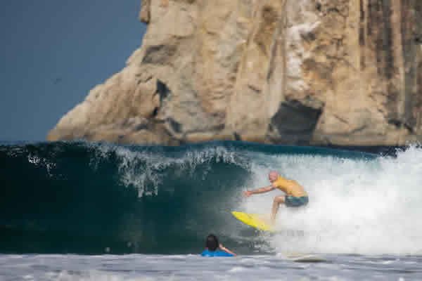 Surfing Witches Rock from Playas del Coco, by boat